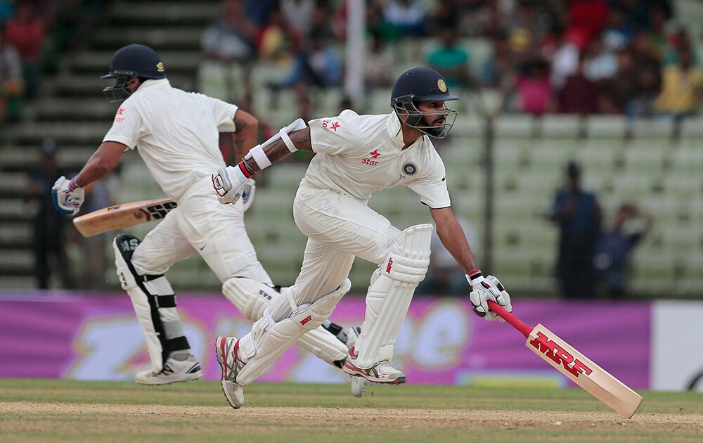 मुरली विजय आणि शिखर धवन  - कसोटी सामन्यात फतुल्लाह, बांग्लांदेश  
