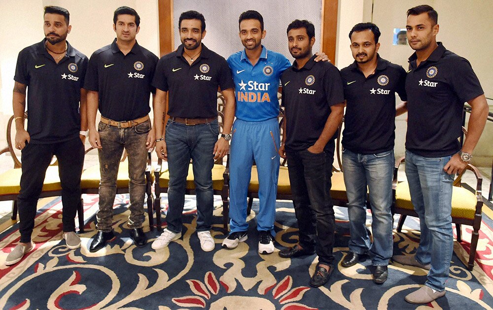Indian captain Ajinkya Rahane along with team mates Murli Vijay, Mohit Sharma, Robin Uthappa, A Rayudu, Kedar Jadhav and Stuart Binny posing for media during a pre departure press conference in Mumbai.
