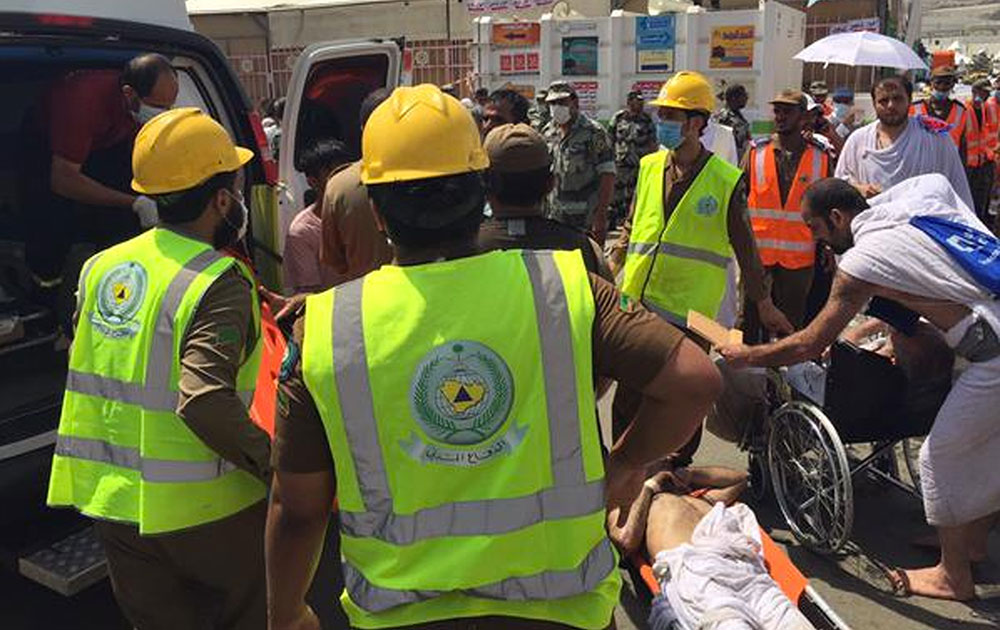 In this image posted on the official Twitter account of the directorate of the Saudi Civil Defense agency, rescuers respond to a stampede that killed and injured pilgrims in the holy city of Mina during the annual hajj pilgrimage.
