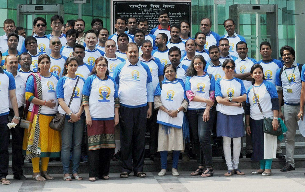 Director General (M&C), Press Information Bureau, A P Frank Noronha with the journalists at the National Media Centre in New Delhi on Monday, before their departure to World Yoga Day event at Chandigarh. 
