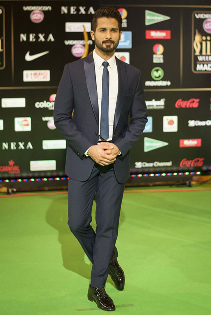 Shahid Kapoor poses for photographers at IIFA