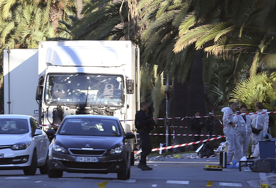The truck which slammed into revelers is seen near the site of an attack