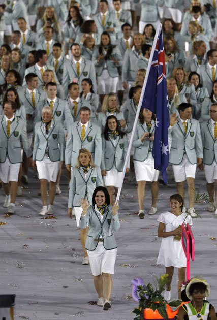 Anna Meares carries the flag of Australia