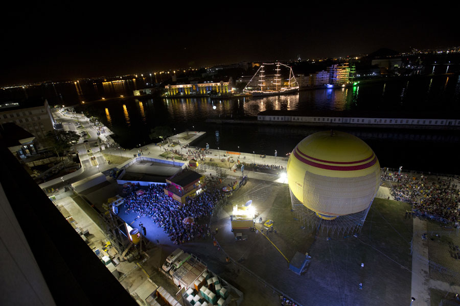 People gather to watch the opening ceremony