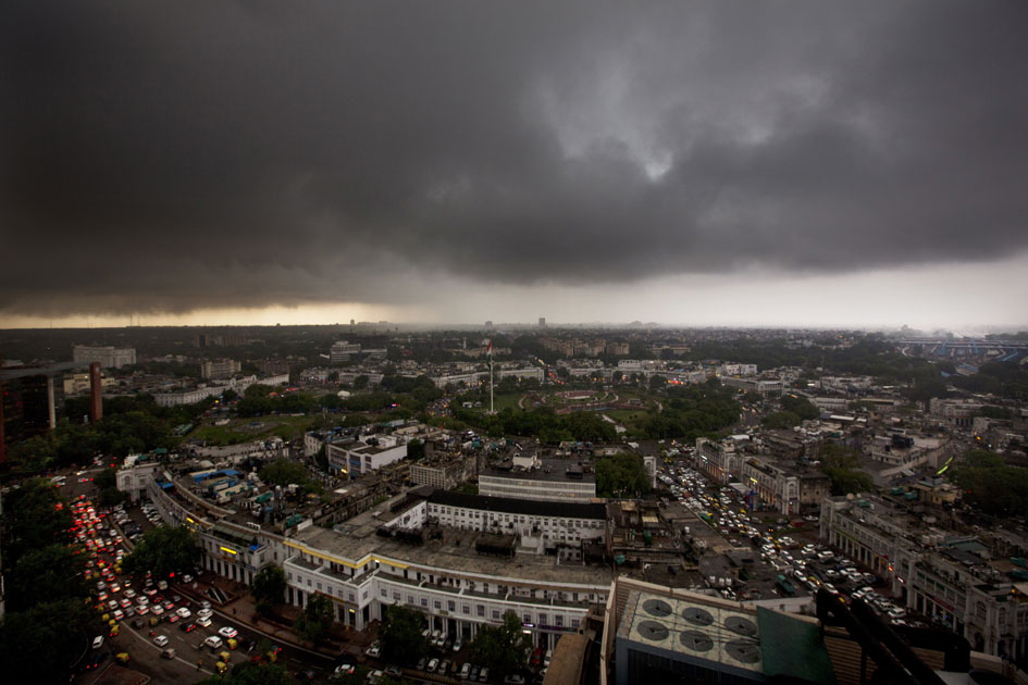 Monsoon clouds gather over the skyline of New Delhi.