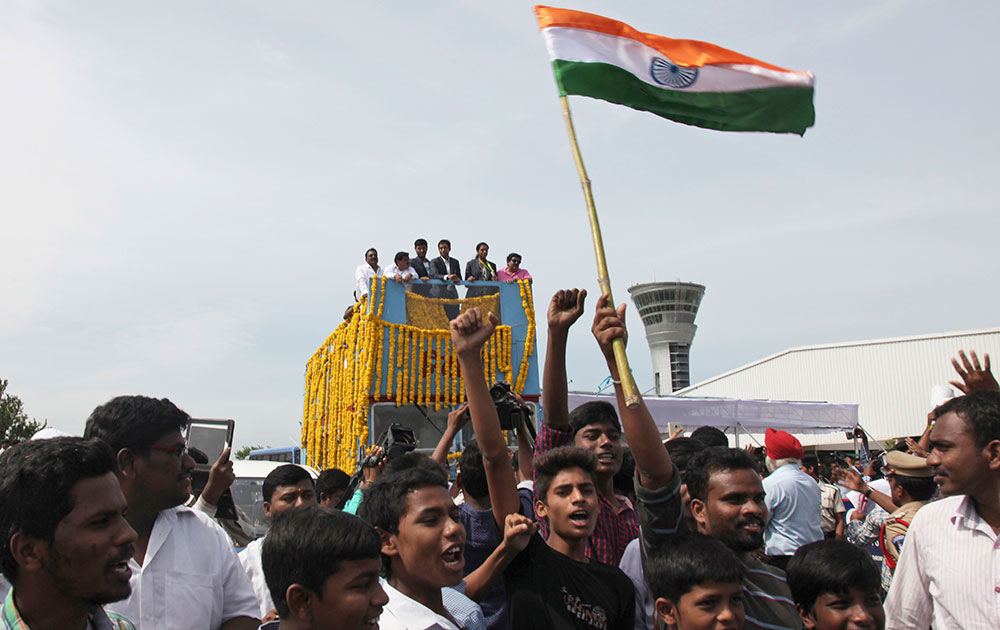 Pusarla Sindhu is brought home in a procession along with her coach Pullela Gopichand upon their arrival at Hyderabad