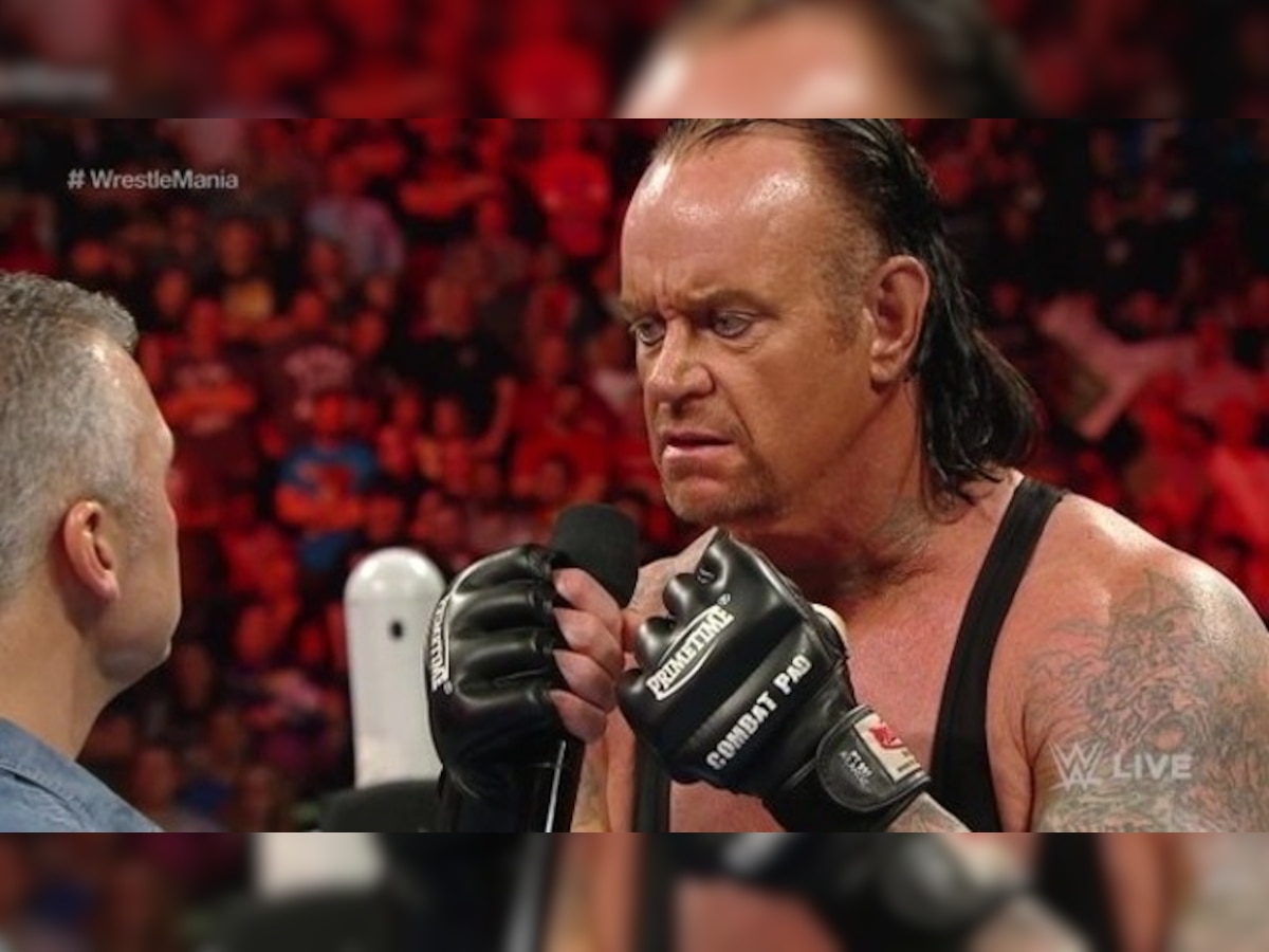 पराभवानंतर अंडरटेकरचा WWEला अलविदा title=