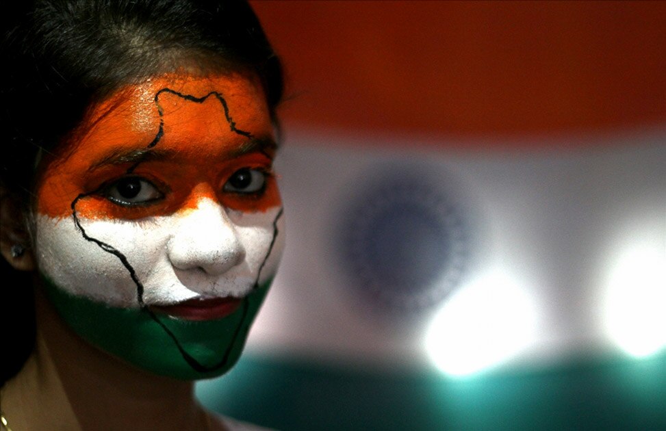 A girl with the Indian map painted on her face