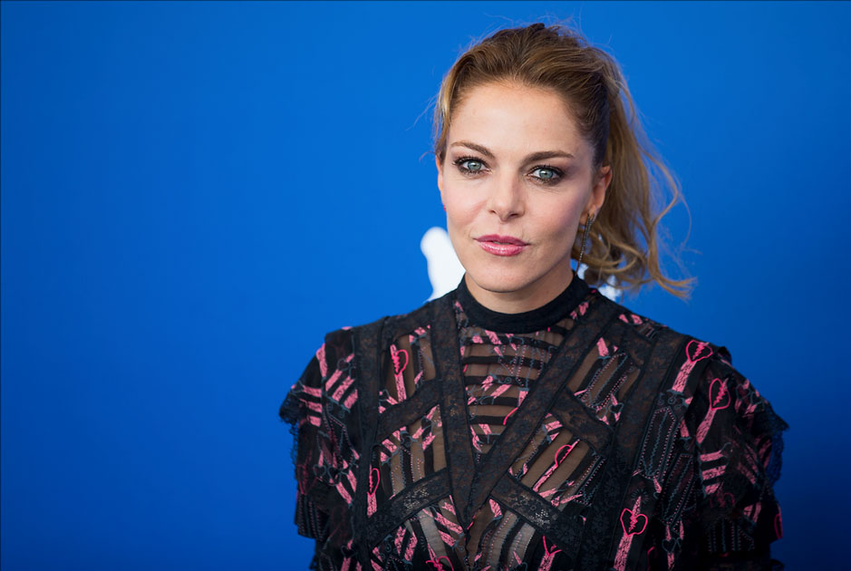 Actress Claudia Gerini poses during a photocall