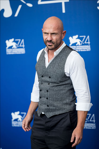 Actor Raiz poses during a photocall