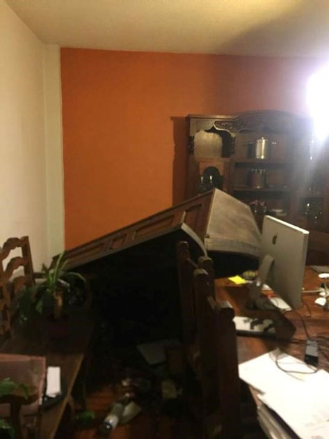 Fallen furniture in an apartment is pictured after an earthquake in Mexico City