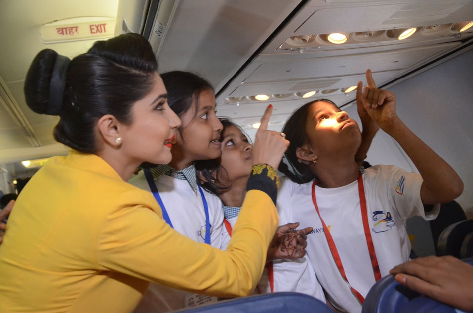 An air hostess with the children during 