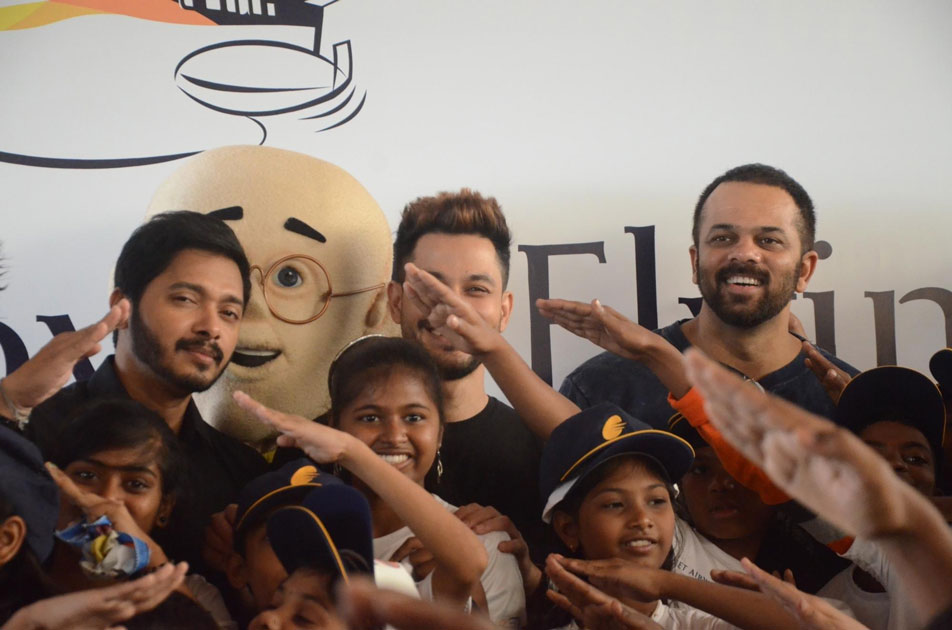 Filmmaker Rohit Shetty and actors Shreyas Talpade and Kunal Khemu with children during a programme organised to announce `Flight of Fantasy` by Jet Airways ahead of Children`s Day at Chhatrapati Shivaji International Airport in Mumbai.