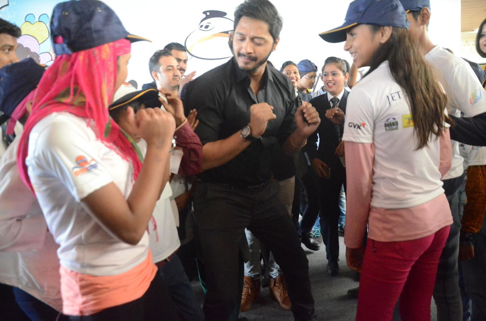 Actor Shreyas Talpade with children during a programme organised to announce `Flight of Fantasy` by Jet Airways ahead of Children`s Day at Chhatrapati Shivaji International Airport in Mumbai.