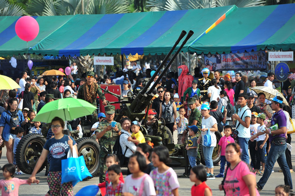 Visitors are seen around an anti-aircraft gun (AA gun) during a Children`s Day public-opening event at the Royal Thai Naval Academy in Bangkok, Thailand.