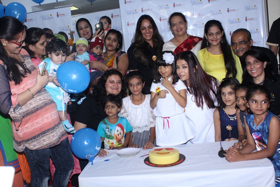 5Actress Aishwarya Rai Bachchan along with her mother Brindya Rai, daughter Aaradhya Bachchan and children born with cleft lips and palates of `Smile Train` celebrates her father Krishnaraj Rai`s birth anniversary at Shushrusha Hospital, in Mumbai.