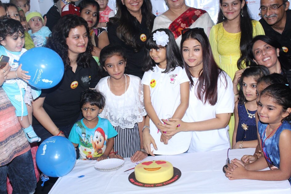 6Actress Aishwarya Rai Bachchan along with her mother Brindya Rai, daughter Aaradhya Bachchan and children born with cleft lips and palates of `Smile Train` celebrates her father Krishnaraj Rai`s birth anniversary at Shushrusha Hospital, in Mumbai.