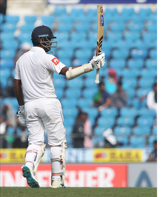 Dimuth Karunaratne of Sri Lanka celebrates his half century on Day 1 of the second test match between India and Sri Lanka at Vidarbha Cricket Association Stadium in Nagpur.