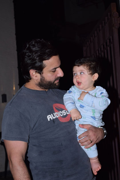 Actor Saif Ali Khan along with his son Taimur Ali Khan at Actress Soha Ali khan`s residence on the occasion of her birthday in Mumbai.