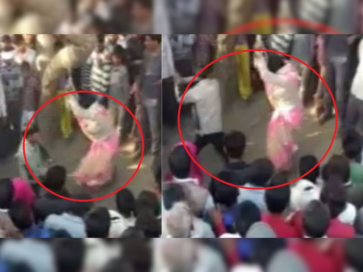 महिलेला झाडाला बांधून पतीने केली बेल्टने मारहाण, बघ्यांनी मदतीऐवजी केले VIDEO शूटिंग title=