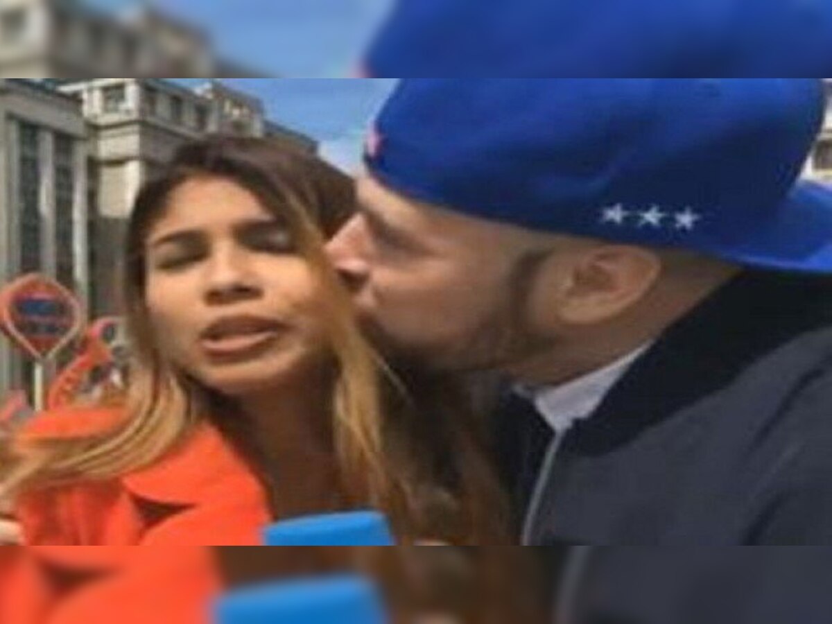 VIDEO : फीफा वर्ल्ड कपमध्ये फॅनची महिला पत्रकाराला लाइव्ह शोमध्ये KISS  title=