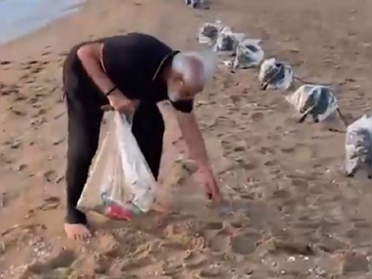 पंतप्रधान मोदींचा समुद्रकिनाऱ्यावर फेरफटका; साफसफाईचा व्हीडिओ व्हायरल title=