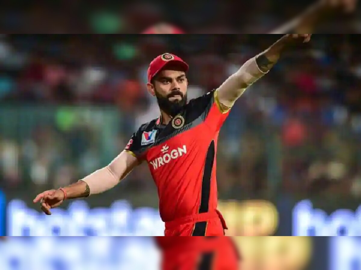 IPL 2021 : RCBचा दारुण पराभव, पण कोहली KKRच्या 'या' बॉलर्सच्या कामगिरीवर खूश  title=