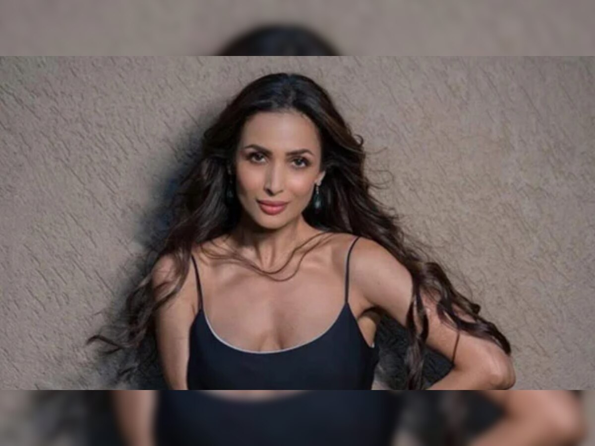  malaika arora रेस्टॉरेंटमधून बाहेर येताना जीन्स वर करायला विसरली आणि... title=