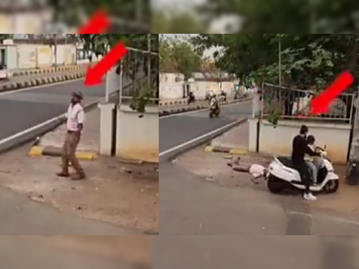 ड्युटी करताना ट्रॅफिक पोलीस रस्त्यावर बेशुद्ध, वाचवायला पुढे आली महिला आणि...पाहा VIDEO title=