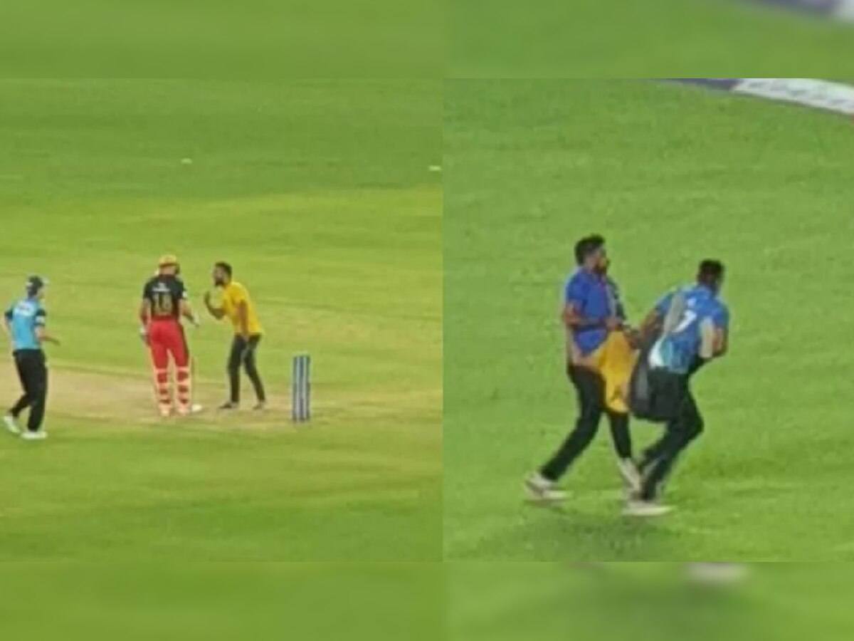 VIDEO: मैदानात घुसलेल्या फॅनने स्वतः Virat Kohli चा हात धरला आणि.... title=