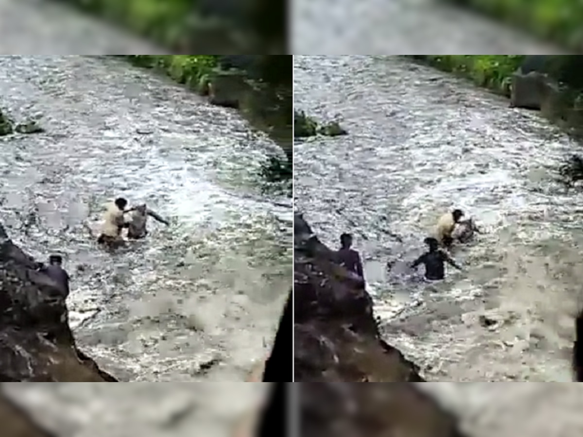 त्यांची ती धडपड फक्त त्या व्यक्तीला वाचवण्यासाठी, दोन पोलिस पाण्यात उरतले आणि... पाहा व्हिडीओ title=