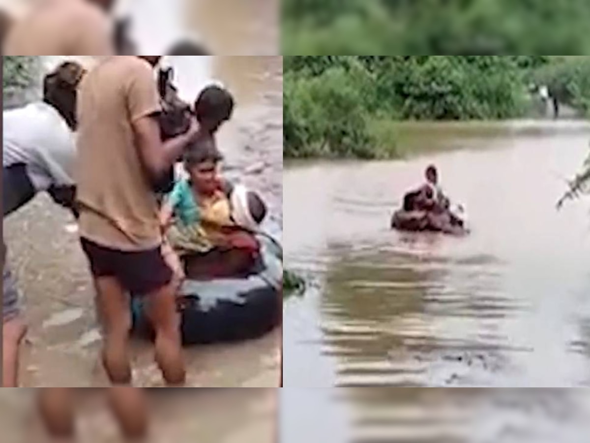 लेकराला दवाखान्यात नेण्यासाठी आईचा पूरातून जीवघेणा प्रवास; व्हिडिओ व्हायरल झाल्यानंतर अधिकारी पोहोचले गावात title=