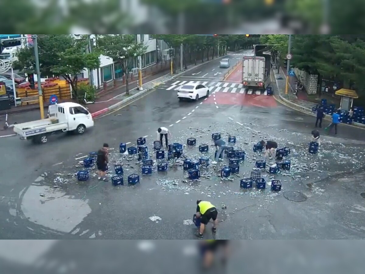 Viral Video : बॉटल्स फुटल्याने रस्त्यावर बिअरचा पूर title=