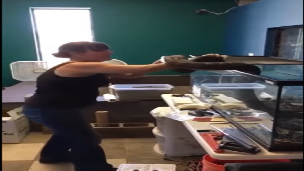 viral python attacked on woman she is in trouble asking for help