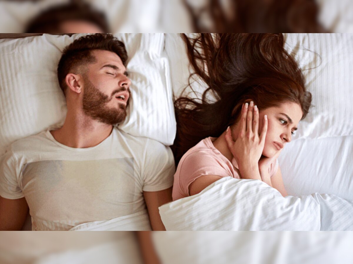 Snoring: तुमच्या घोरण्याचा जोडीदाराला त्रास होतो? 'या' टिप्स करा फॉलो title=