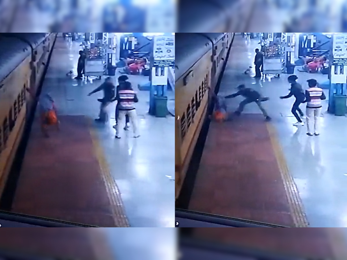 Video : धावत्या रेल्वेतून महिला खाली पडली अन्... title=