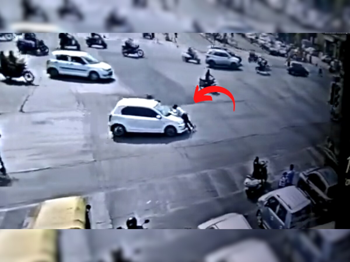 WATCH: कार चालकाची मुजोरी! वाहतूक पोलिसाला बोनेटवरुन फरफटत नेलं, घटनेचा CCTV Video समोर title=