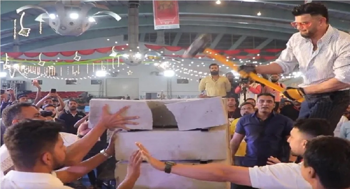 Heaviest concrete block break on a bed of nails sandwich 528 kilograms