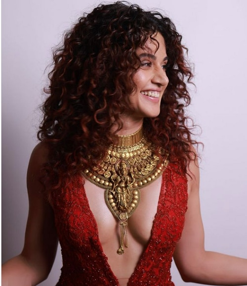 bollywood Actress taapsee pannu gets trolled and slamed for godess laxmi necklace with bold outfit 