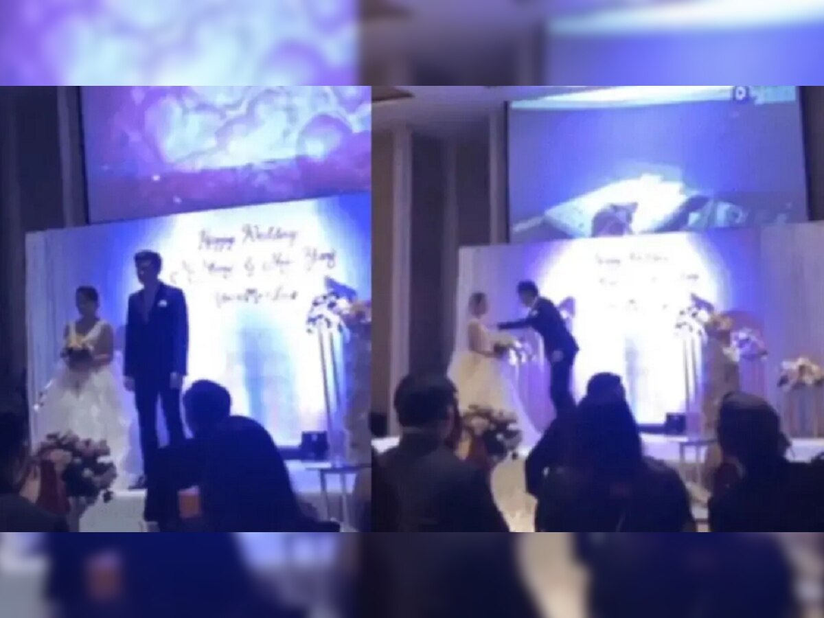 Viral Video : रिसेप्शन पार्टीमध्ये नवरदेवाने वधूचं अफेयरचा व्हिडीओ सगळ्यांसमोर लावला अन् मग... title=