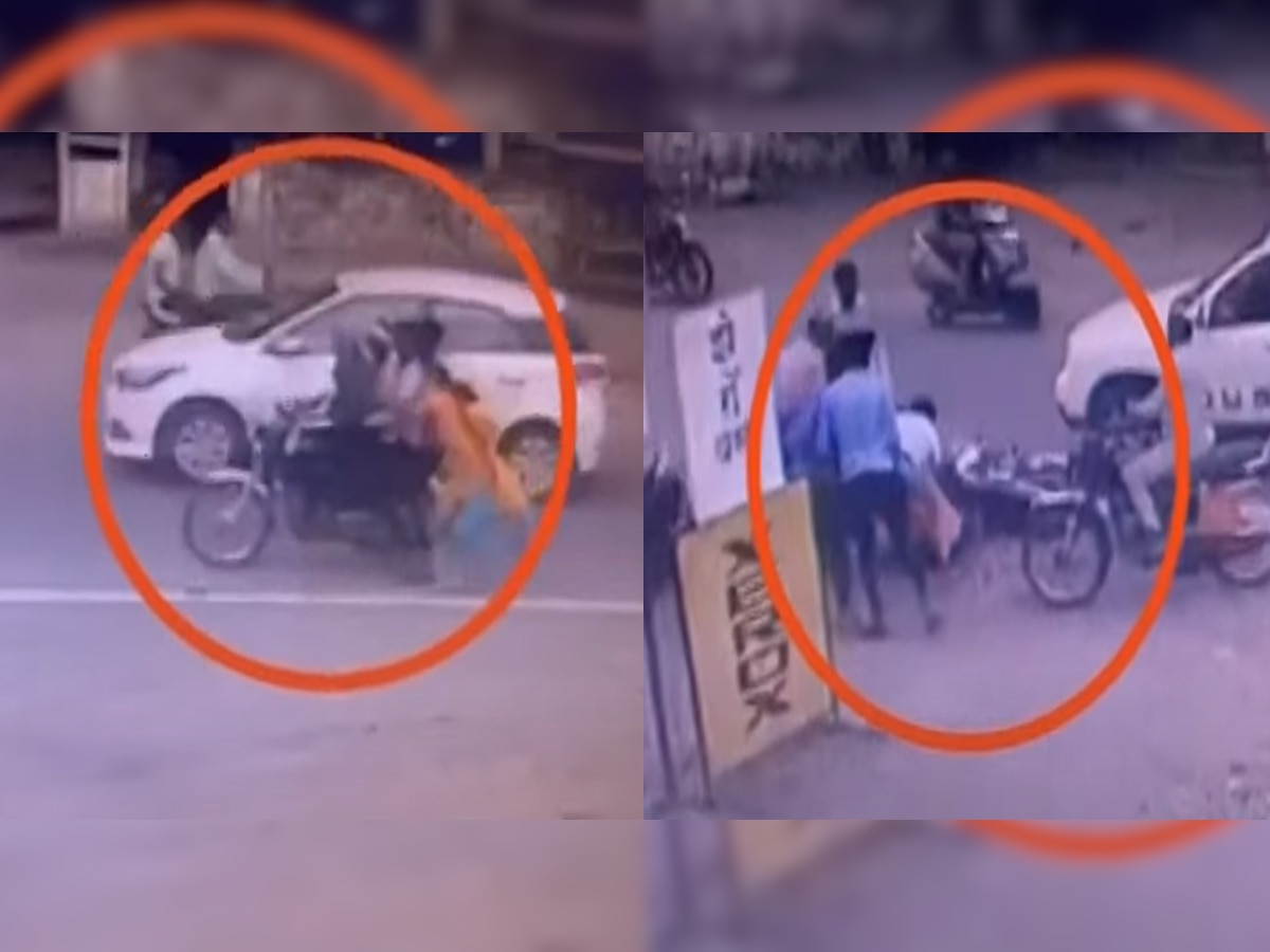 Video : कारचालकाने दरवाजा उघडला अन्... महिलेला फरफटत नेणाऱ्या चोरट्यांना तरुणामुळे झाली अटक title=