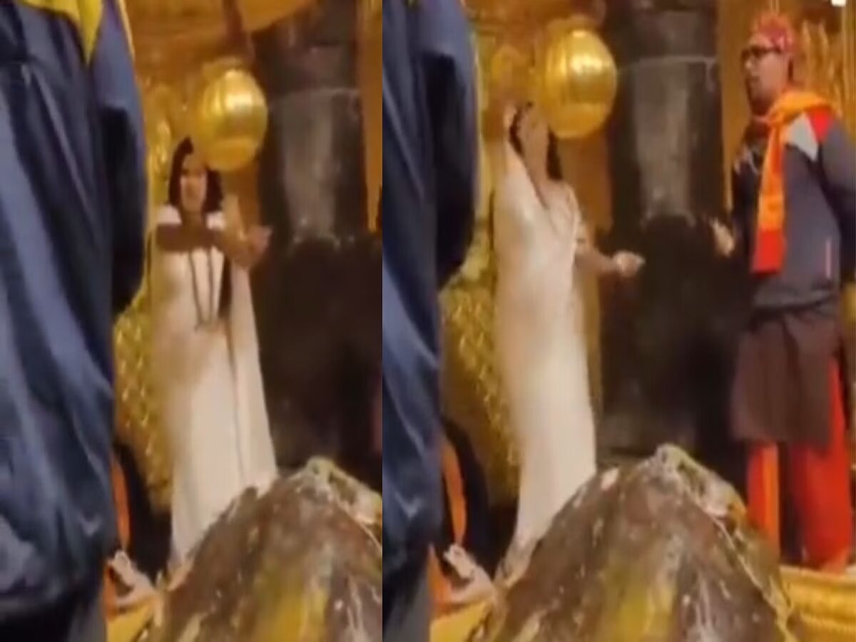 धक्कादायक! केदारनाथ मंदिरात महिलेने पुजाऱ्यासमोरच उधळलं नोटांचे बंडल; Video Viral title=