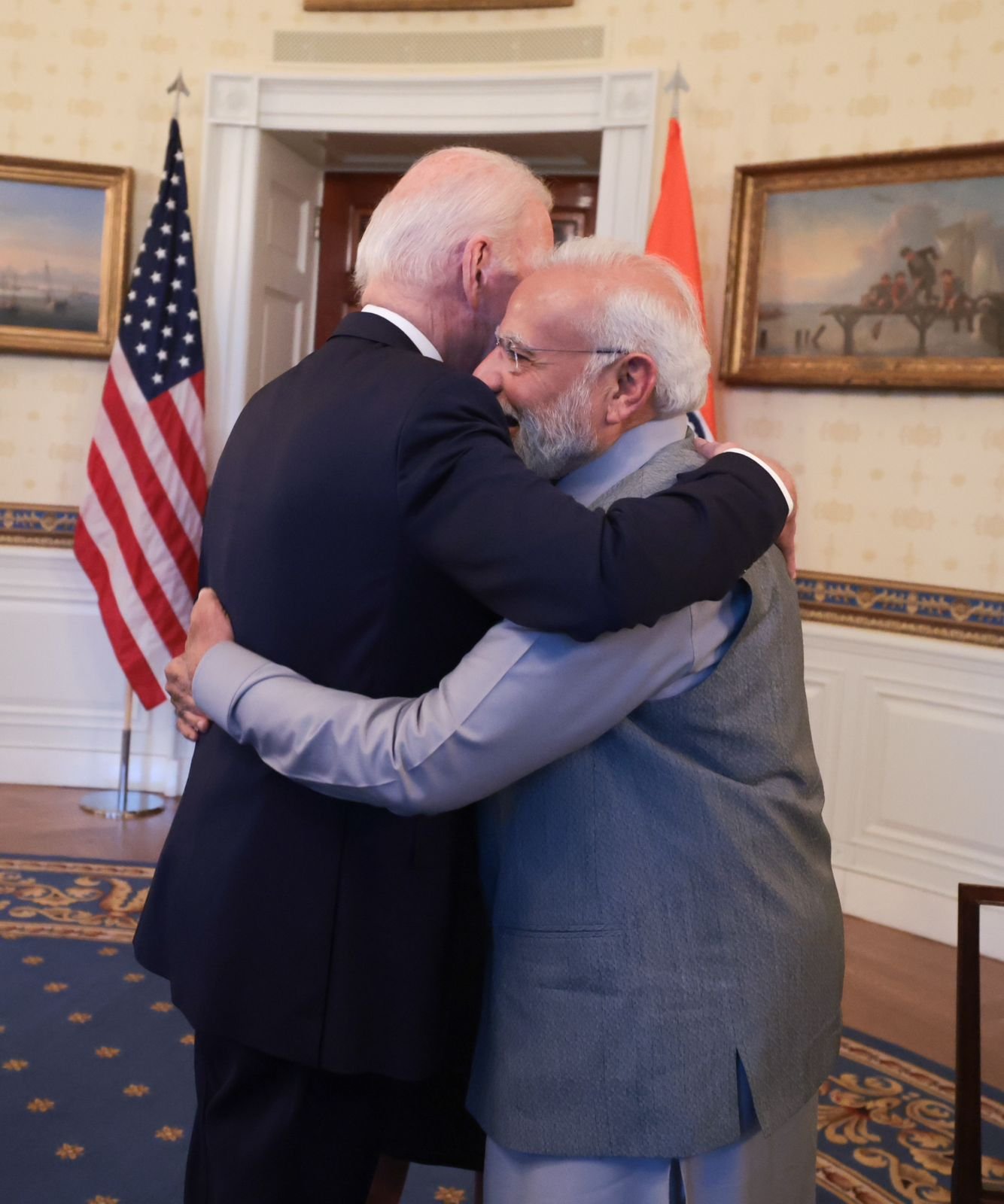 Prime Minister Narendra Modi presents a special sandalwood box to US President Joe Biden