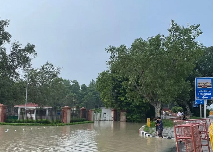 yamuna water level increases resulting water loging near supreme court rajghat and red fort photos 