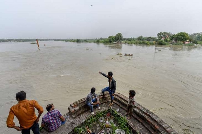 yamuna water level increases resulting water loging near supreme court rajghat and red fort photos 