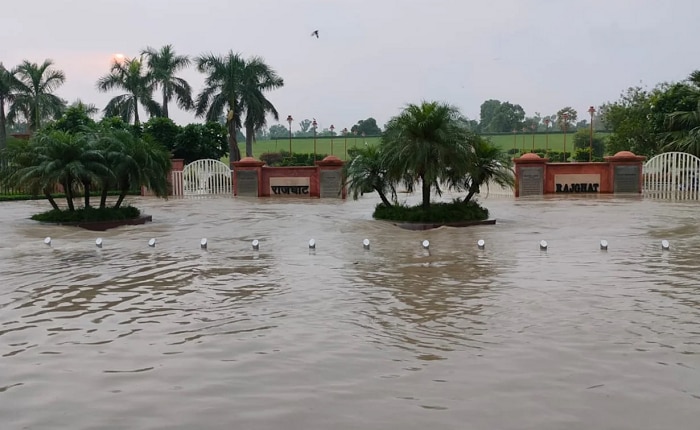 yamuna water level increases resulting water loging near supreme court rajghat and red fort photos 