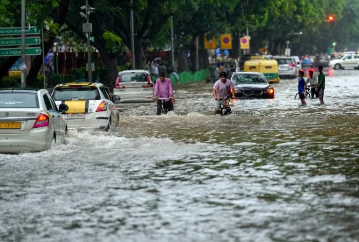 yamuna water level increases resulting water loging near supreme court rajghat and red fort photos 