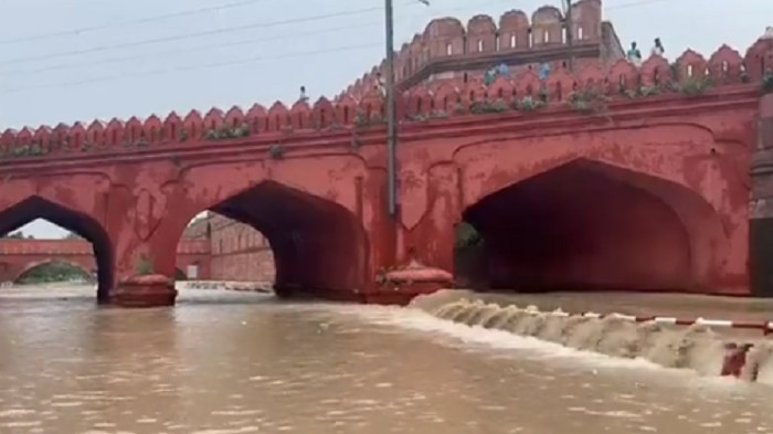 yamuna water level increases resulting water loging near supreme court rajghat and red fort photos 