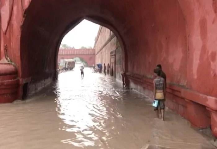 yamuna water level increases resulting water loging near supreme court rajghat and red fort photos 