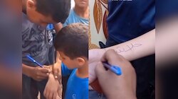 Israel-Hamas War: हातावर नावं का लिहिताहेत गाझातील मुलं? कारण ऐकून अंगावर काटा येईल